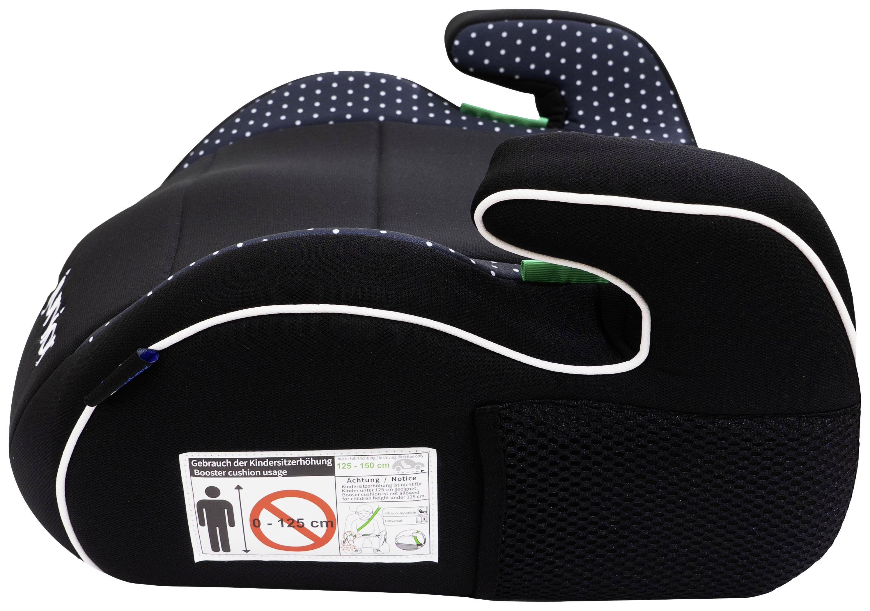 Czarny fotelik dziecięcy z podłokietnikami, oparcie w kropki. Naklejka bezpieczeństwa pokazuje wskazówki użycia.