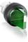 Zielony przycisk sterowniczy z czarnym pierścieniem, używany do sterowania maszynami lub urządzeniami elektrycznymi, często sygnalizujący stan 'Włączony'.