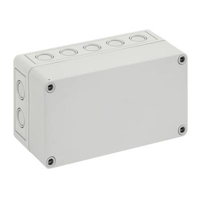 Elektryczna puszka przyłączeniowa z szaworego tworzywa sztucznego z kilkoma okrągłymi otworami dla przewodów. Śruby w narożnikach służą do mocowania.