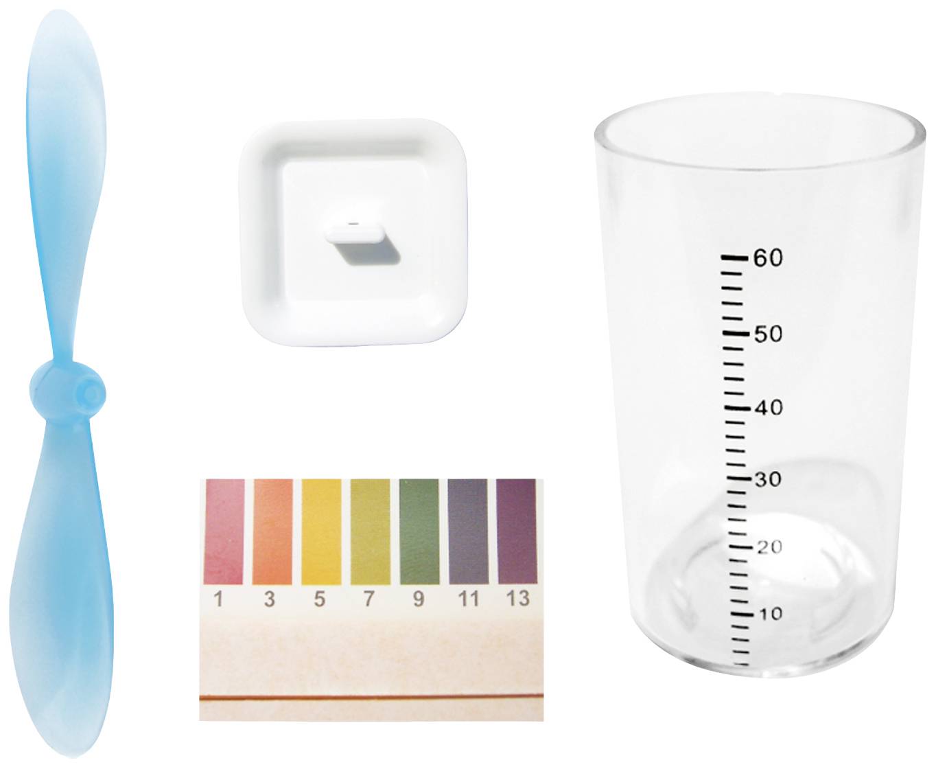 Naczynie miarowe ze skalą, niebieski śmigłowiec, biały kwadratowy przedmiot oraz pasek do pomiaru pH z kolorową skalą od 1 do 13.