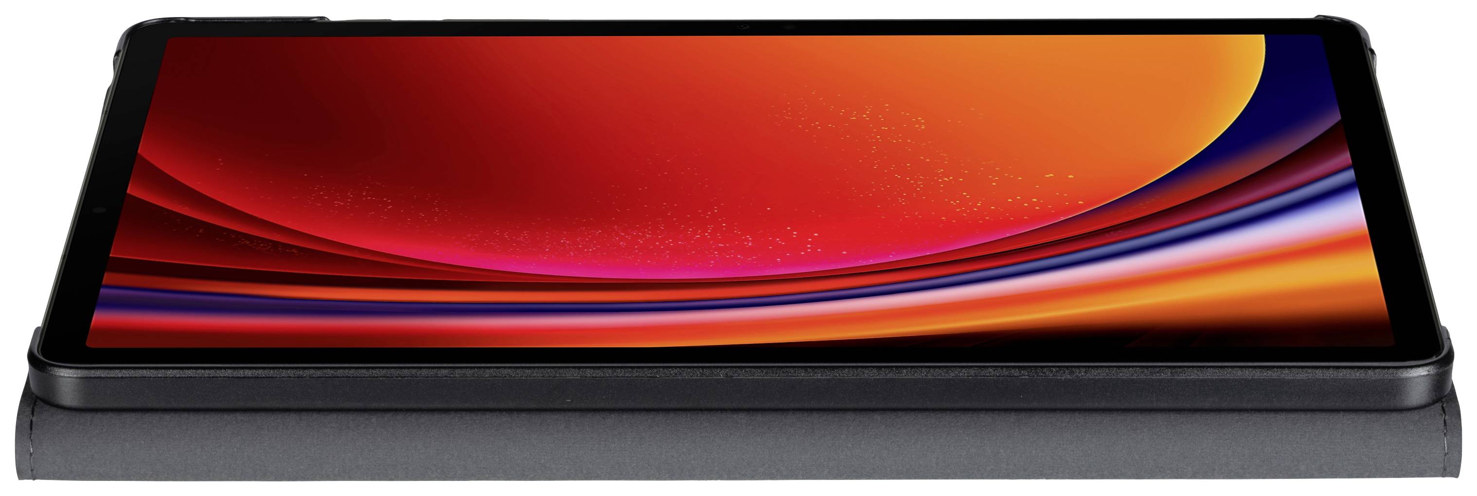 Tablet z ekranem w jaskrawoczerwonym kolorze leży płasko na czarnym podłożu.