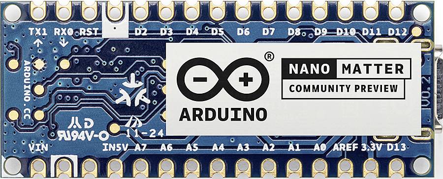 Płytka Arduino z napisem 'Nano Matter, Community Preview'; przedstawiająca komponenty techniczne i punkty przyłączeniowe.