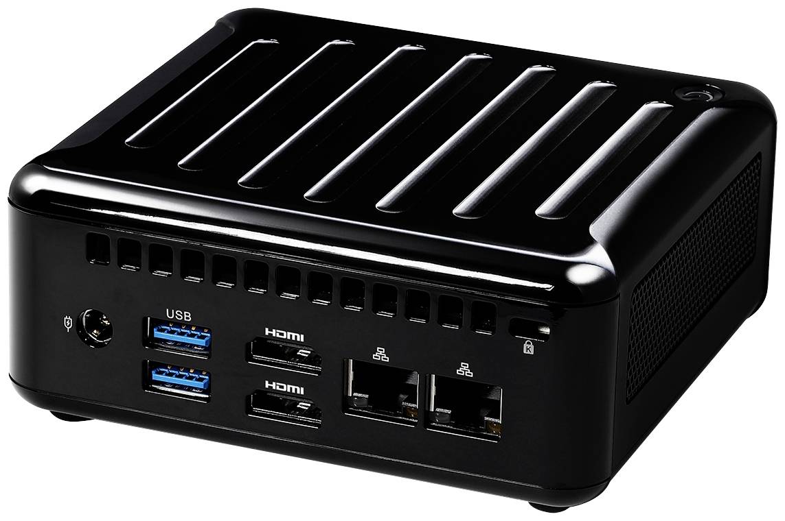 Kompaktowy czarny komputer z wieloma portami USB i HDMI z przodu, nadający się do różnorodnych zastosowań.