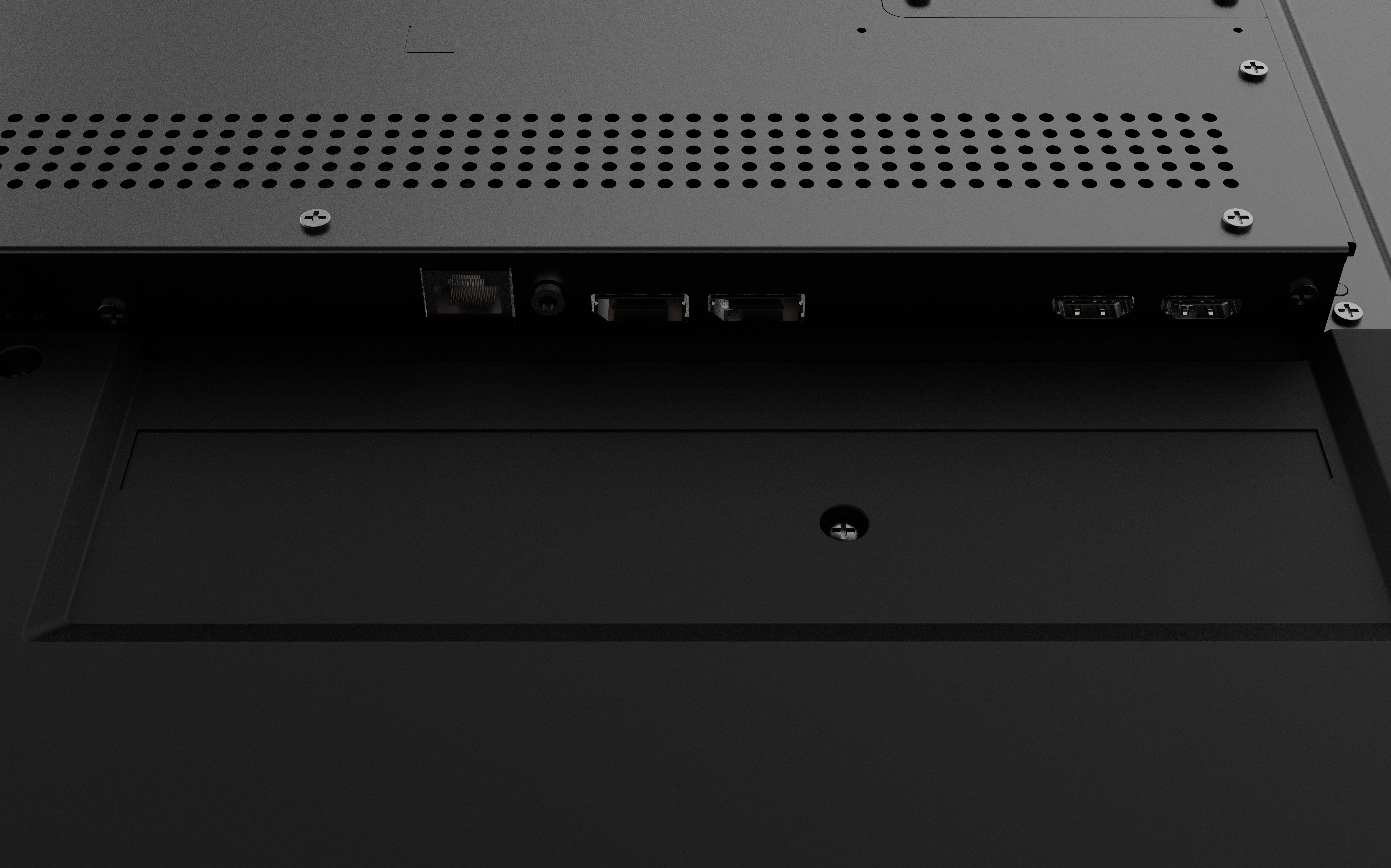 Tylna strona urządzenia elektronicznego z wieloma portami, w tym portem Ethernet. Powierzchnie z otworami wentylacyjnymi.