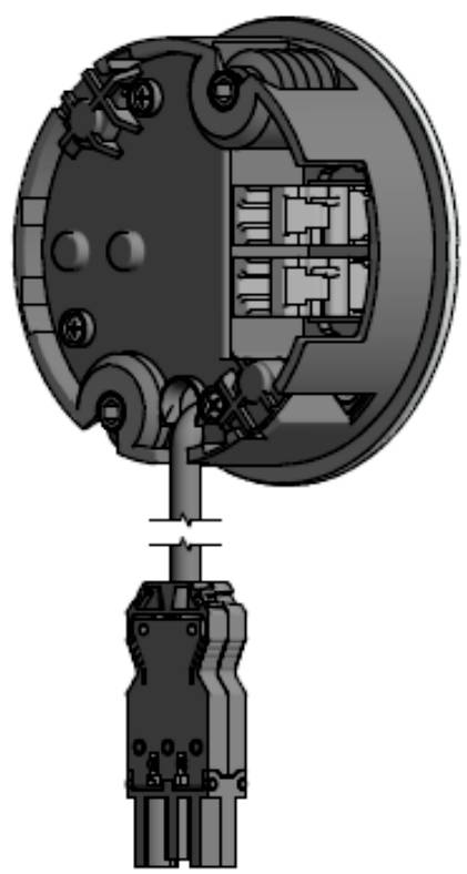 Elektryczny element z okrągłą pokrywą i kilkoma punktami przyłączeniowymi, w tym czarną wtyczką.