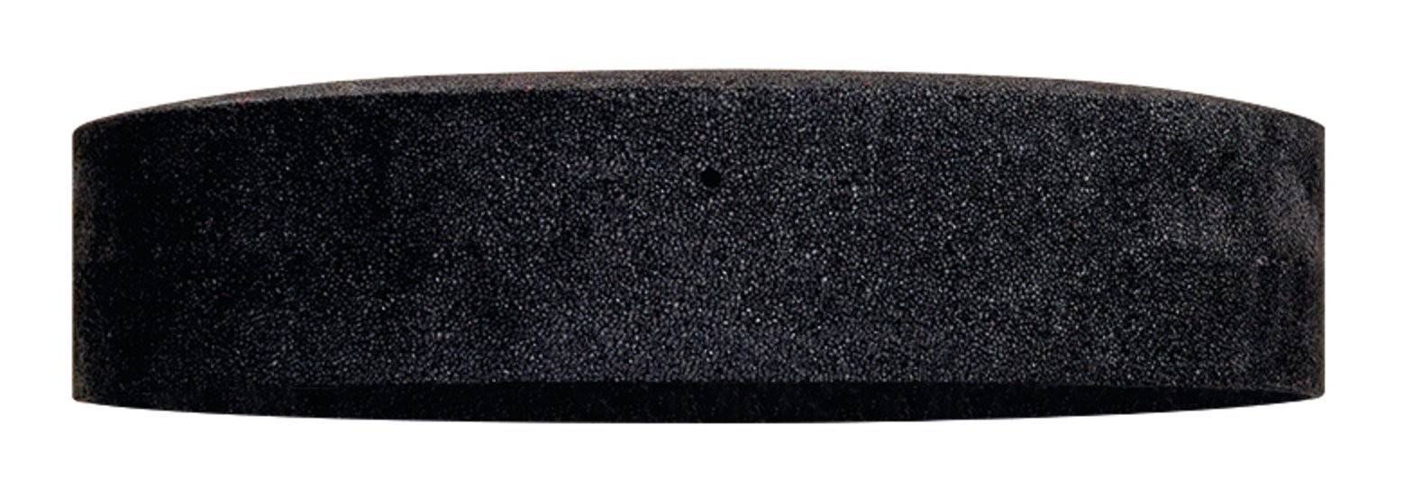 Czarny krążek hokejowy leżący na powierzchni.