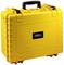 Żółty, wytrzymały kufer transportowy z czarną rączką i klamrami, idealny do ochrony wrażliwego sprzętu podczas przewozu.