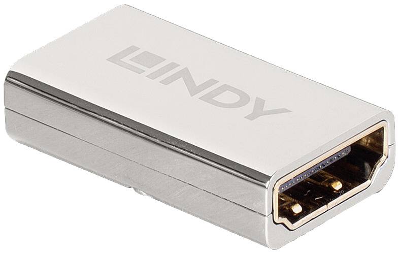 Srebrny adapter łączący HDMI firmy Lindy. Adapter służy do łączenia kabli HDMI w celu przedłużenia zasięgu sygnału.