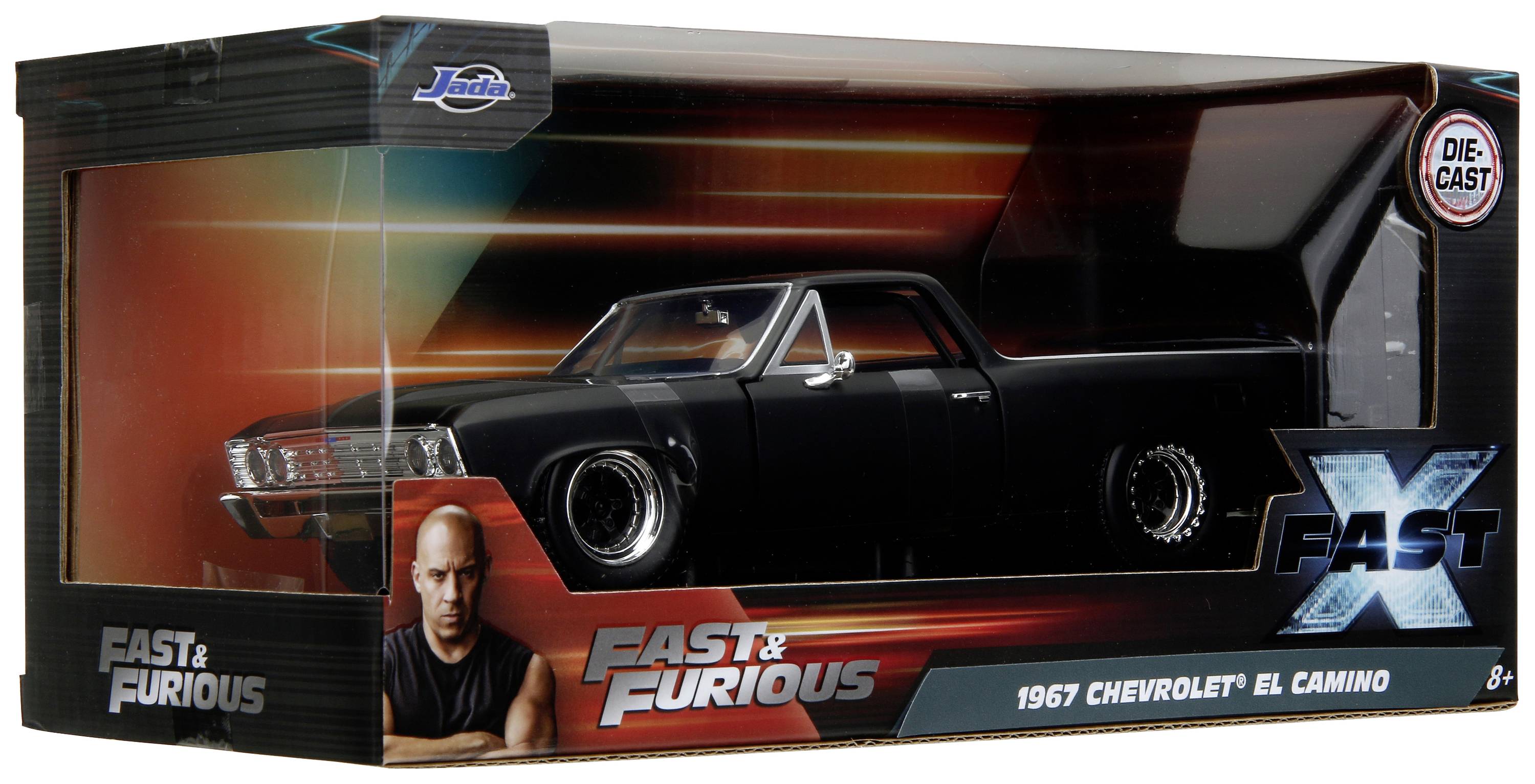 Model samochodu czarnego Chevroleta El Camino z 1967 roku w opakowaniu, oznaczony marką 'Fast & Furious' z wizerunkiem mężczyzny.