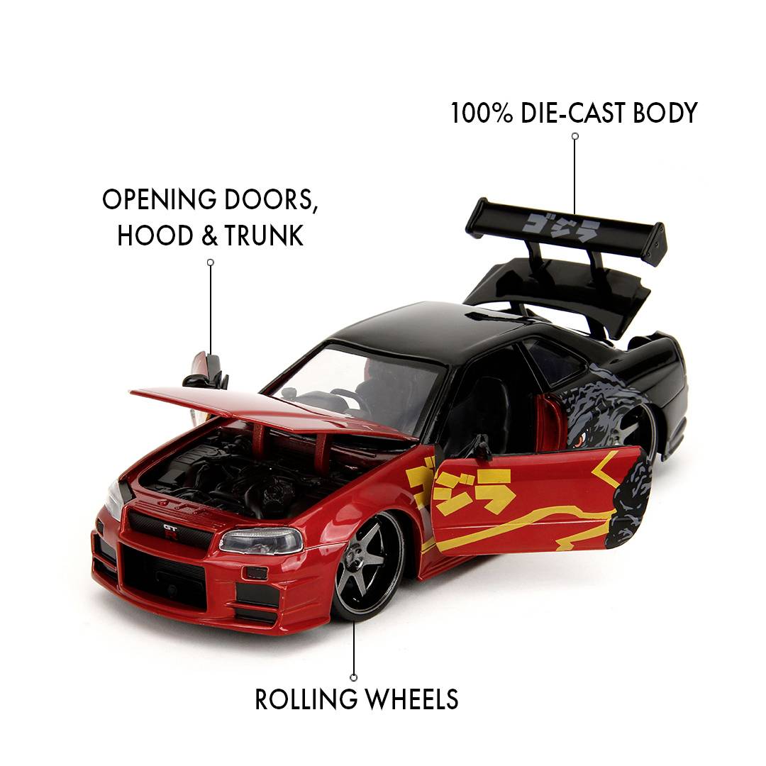 Model samochodu zabawkowego w kolorze czerwonym z czarnymi akcentami, z otwartymi drzwiami, maską i bagażnikiem; 100% odlewany ciśnieniowo.