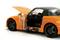 Pomarańczowy model samochodu z otwartymi drzwiami i uniesioną maską silnika; czarne wnętrze; nacisk położony na design i sportowy wygląd.
