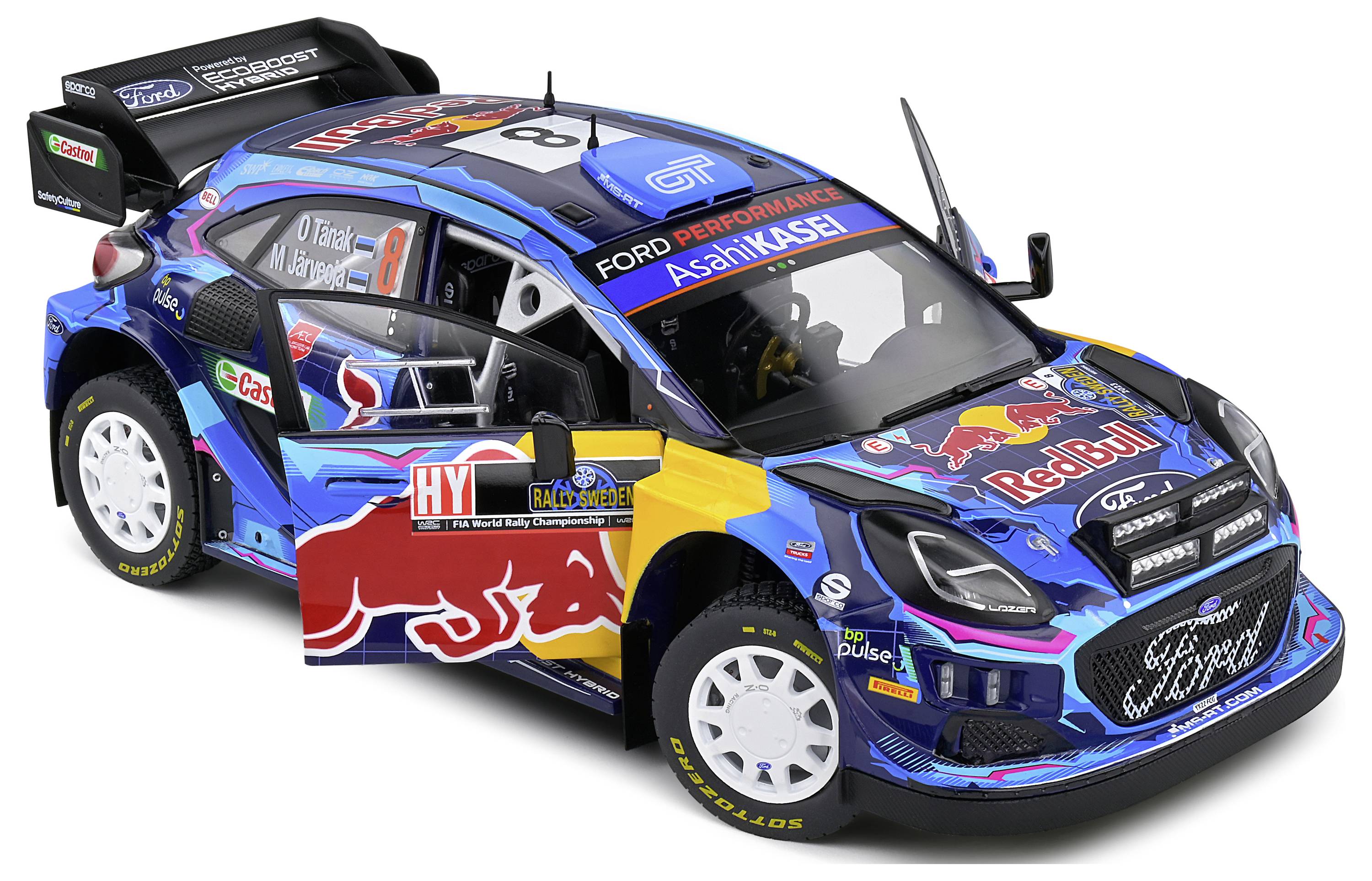 Zabawkowy samochód wyścigowy z kolorowymi naklejkami sponsorów rajdowych, z otwartymi drzwiami; model prezentuje design rajdowy i sponsorów.