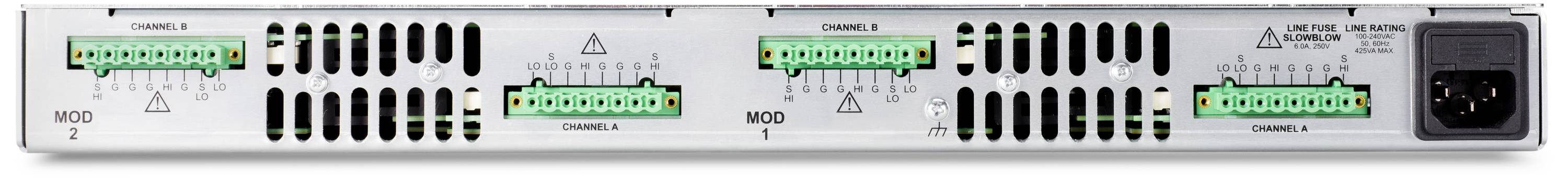 Widok tylnej części urządzenia elektronicznego z wieloma zielonymi złączami i opisami kanałów.