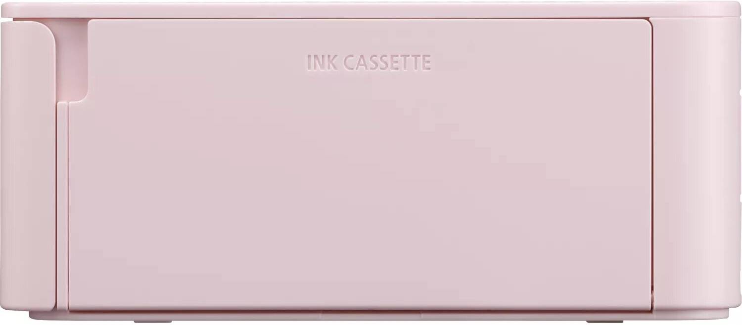 Różowa wkładka atramentowa do drukarki, zamknięta z boku. Powyżej grawerowany napis 'INK CASSETTE'.