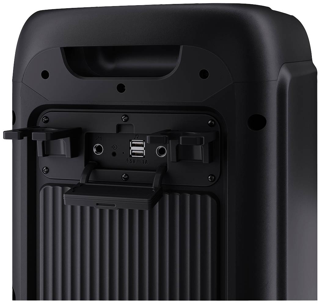 Widok z tyłu czarnego głośnika z portami i elementami sterującymi. Widoczne są dwa porty USB oraz wejście AUX.