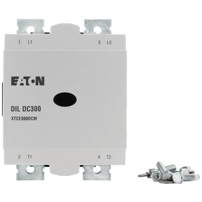 Białą część elektryczną z napisem 'Eaton DIL DC300 XTC E300DCM', obok której leży kilka śrub.