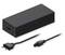 Czarny zasilacz do laptopa z wtyczką europejską i kablem połączeniowym. Zielona dioda LED sygnalizuje stan pracy.
