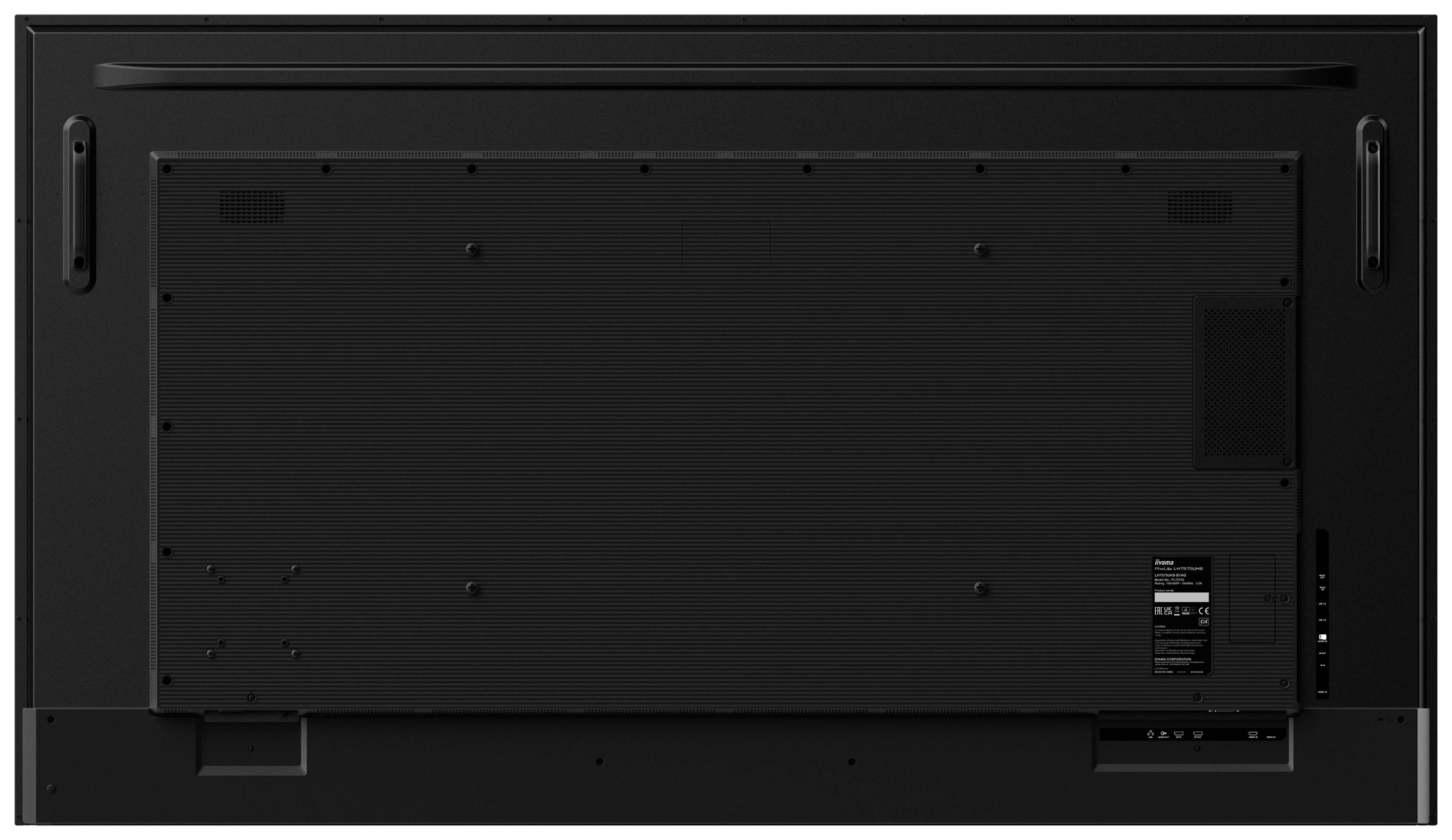 Tylna strona czarnego telewizora z widocznymi złączami i otworami wentylacyjnymi. Brak rozpoznawalnych oznaczeń marki lub modelu.