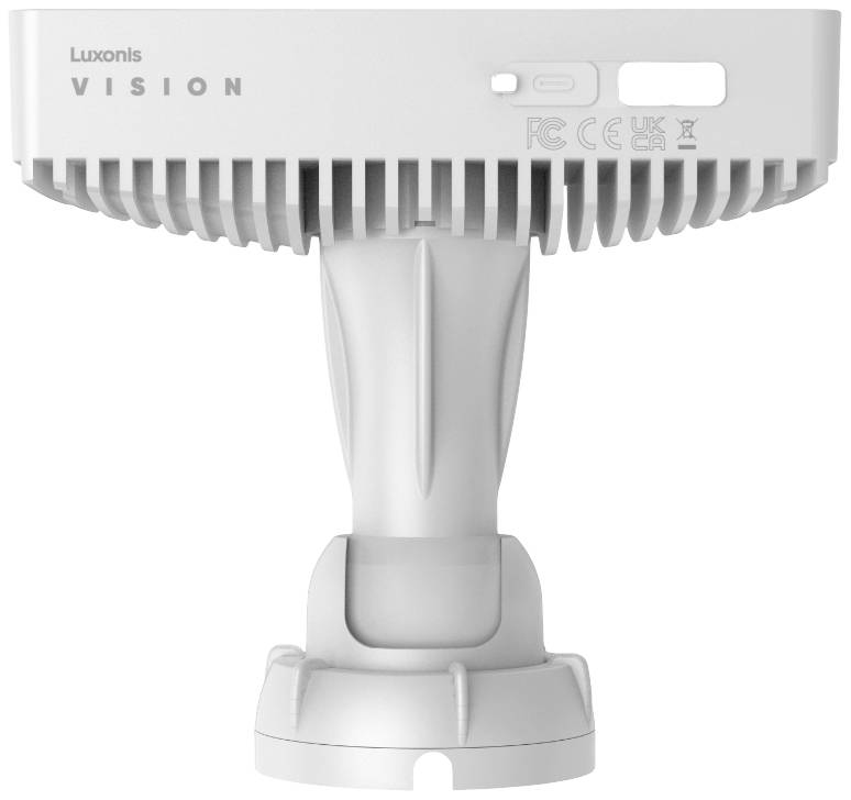 Widok z tyłu białej kamery z napisem 'Luxonis Vision', zamontowanej na stojaku z chłodzonym wzornictwem radiatora.