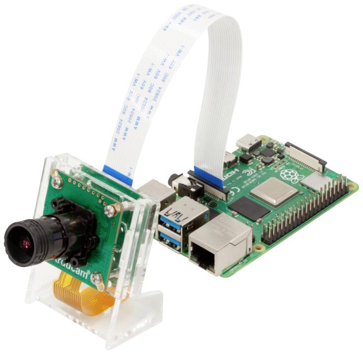 Komputer jednopłytkowy z podłączoną kamerą, połączony białym przewodem taśmowym.