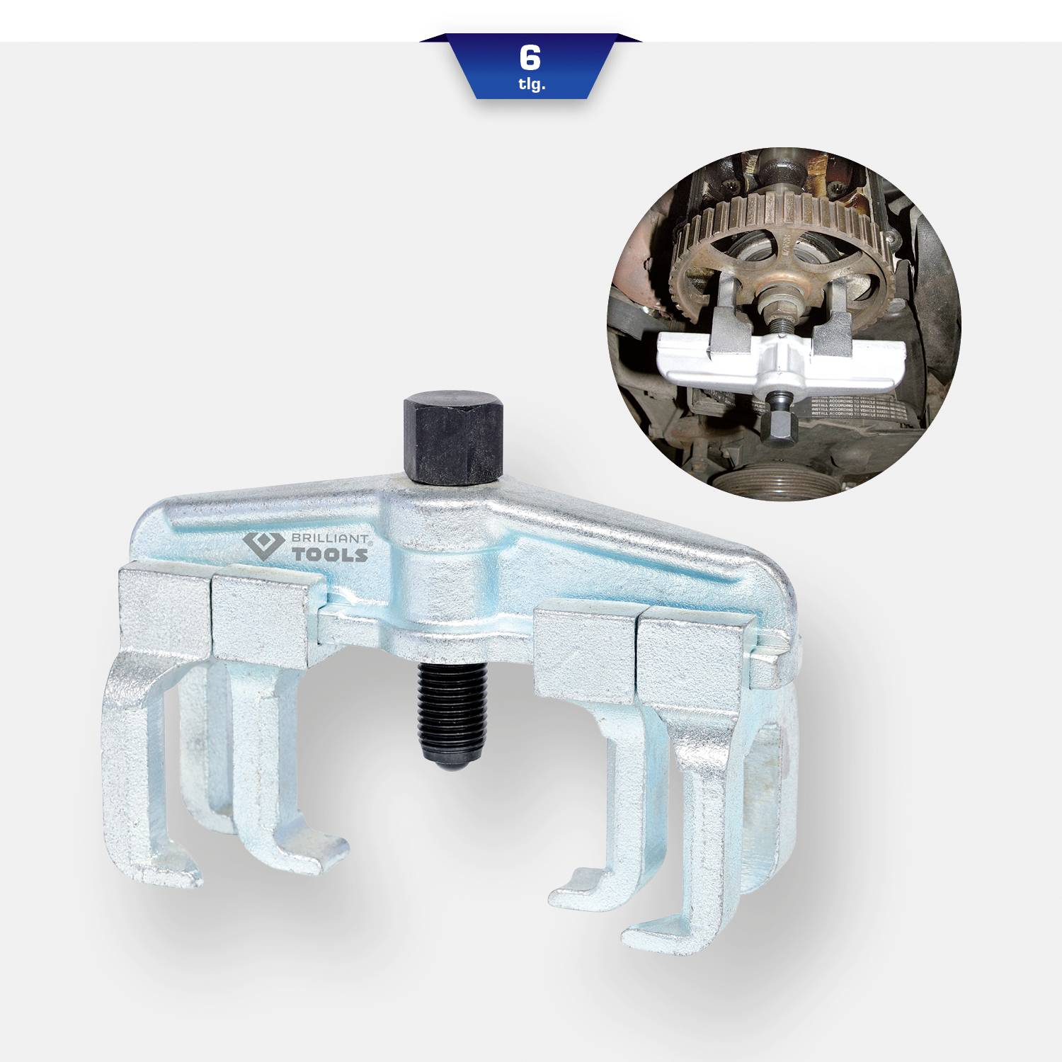 Narzędzie specjalistyczne do usuwania łożysk lub kół zębatych; przedstawia trójramienny przyrząd ściągający użyty przy silniku.