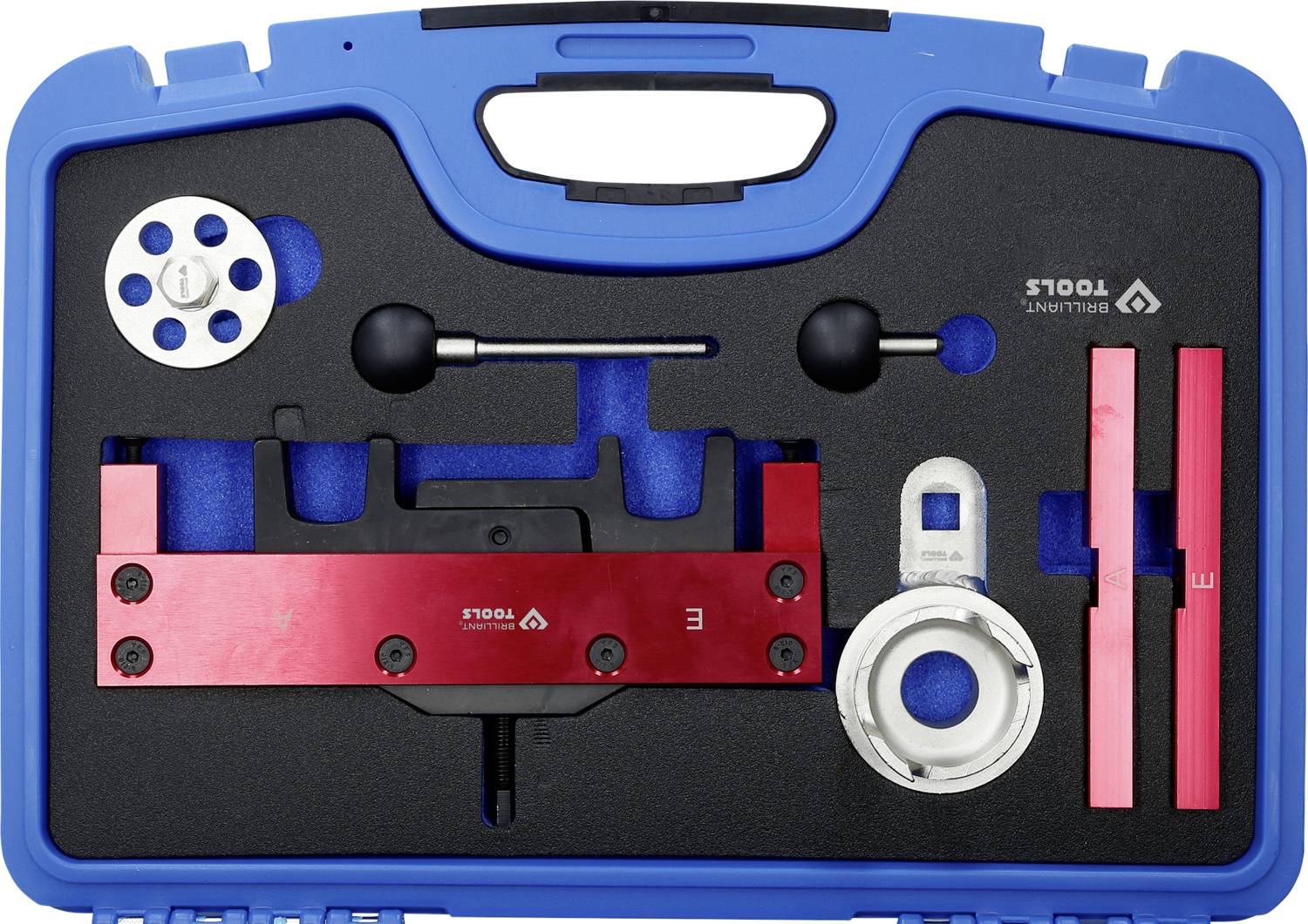 Skrzynka narzędziowa z różnymi precyzyjnie rozmieszczonymi narzędziami metalowymi i osprzętem, w tym czerwonymi i srebrnymi elementami umieszczonymi w podkładce z pianki.