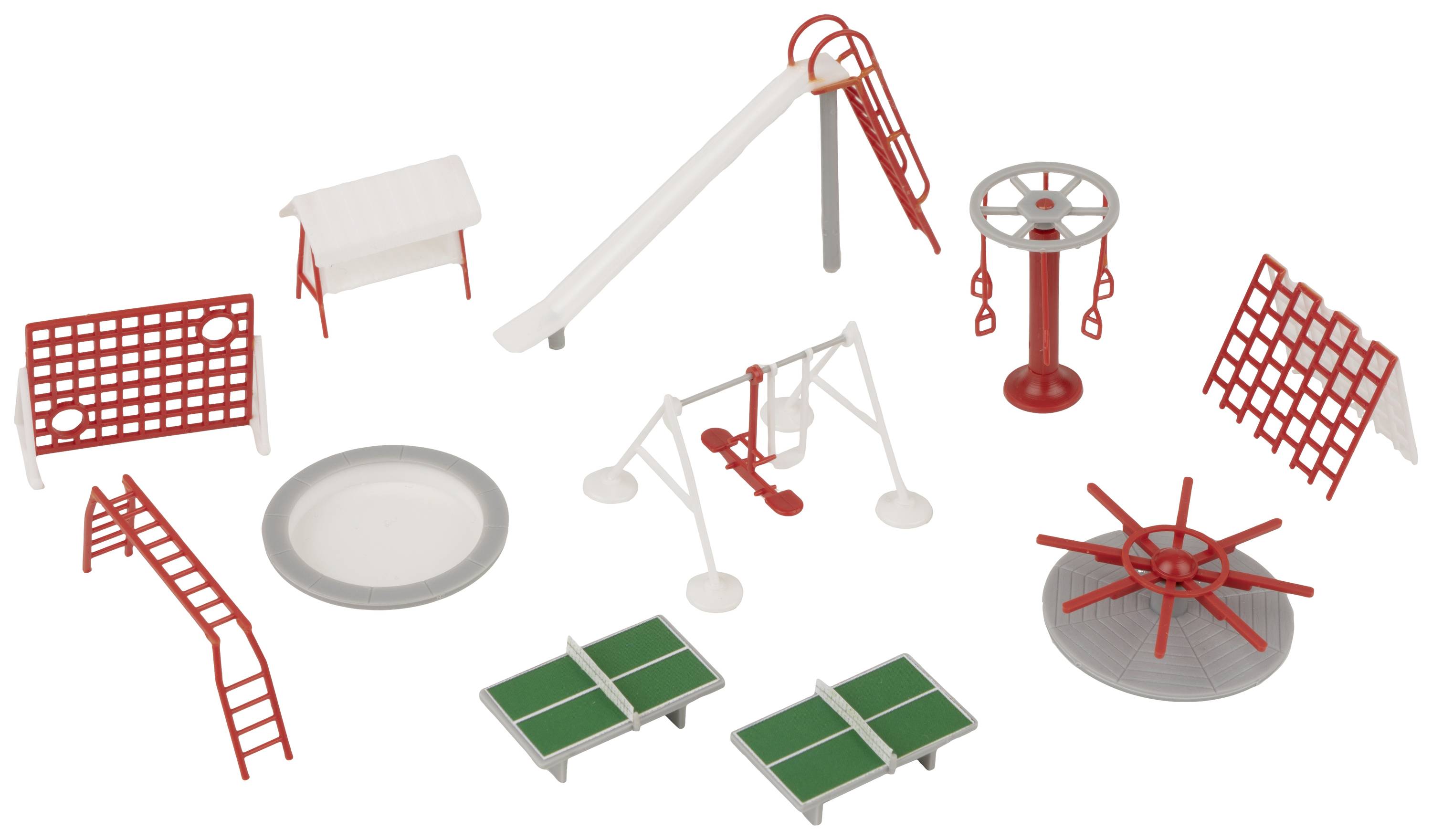 Różne urządzenia do zabawy wykonane z miniaturowego zabawkowego sprzętu, w tym zjeżdżalnia, huśtawki, stół do ping-ponga i karuzela, w kolorach białym i czerwonym.