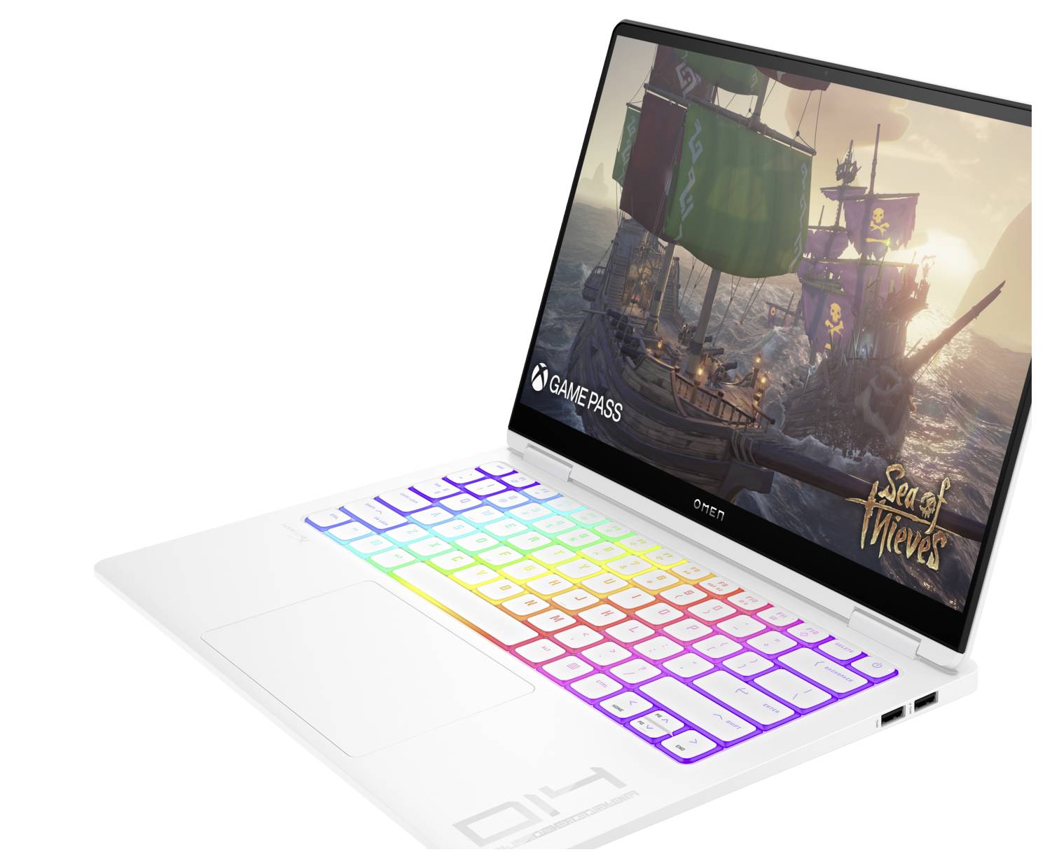 Biały laptop z klawiaturą podświetloną w kolorach tęczy wyświetla na ekranie widok statków z gry wideo.