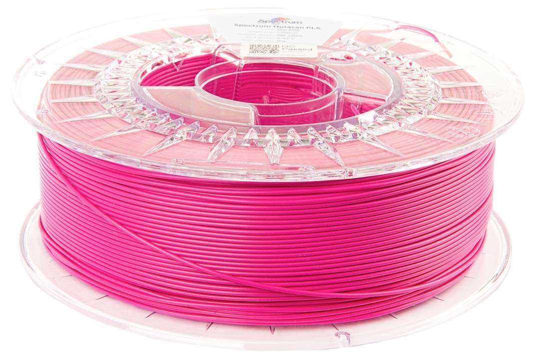 Szpula z różowym (różowym/fuksją) materiałem do druku 3D na przezroczystej rolce plastikowej.