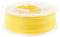 Żółta rolka filamentu do drukarki 3D, czysto nawinięta na przezroczystym plastikowym rdzeniu szpuli, gotowa do użycia.