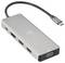 Hub USB-C z wieloma portami: USB-C, VGA, HDMI oraz dwa porty USB-A. Obudowa w kolorze srebrnym, kompaktowa i przenośna.