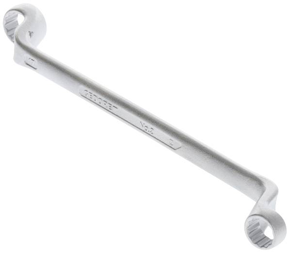 Podwójny klucz płaski z metalu z różnymi rozmiarami końcówek. Narzędzie służące do dokręcania lub odkręcania śrub.