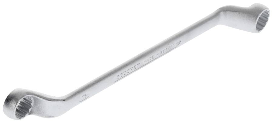 Srebrny klucz płasko-oczkowy z dwoma różnymi rozmiarami sześciokątnymi na każdym końcu, używany do dokręcania nakrętek i łbów śrub.