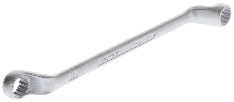 Klucz dwustronny wykonany z metalu o różnych końcówkach; po jednej stronie mniejszy, po drugiej większy. Narzędzie służące do obsługi śrub.