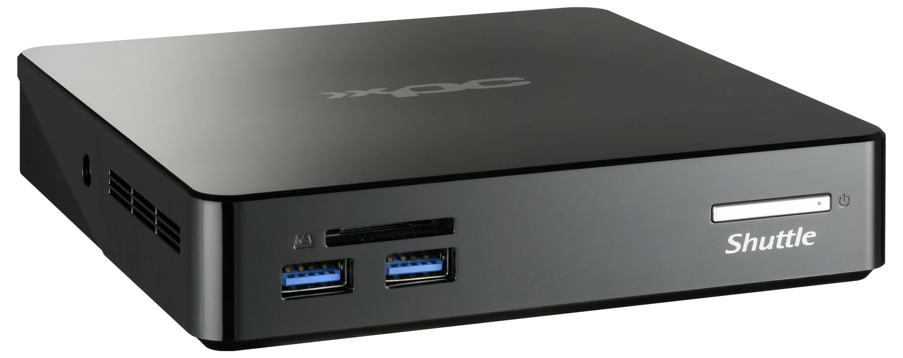 Czarny mini komputer z napisem 'Shuttle' na przedniej części, dwa porty USB, gniazdo na kartę i małą stacją dysków.