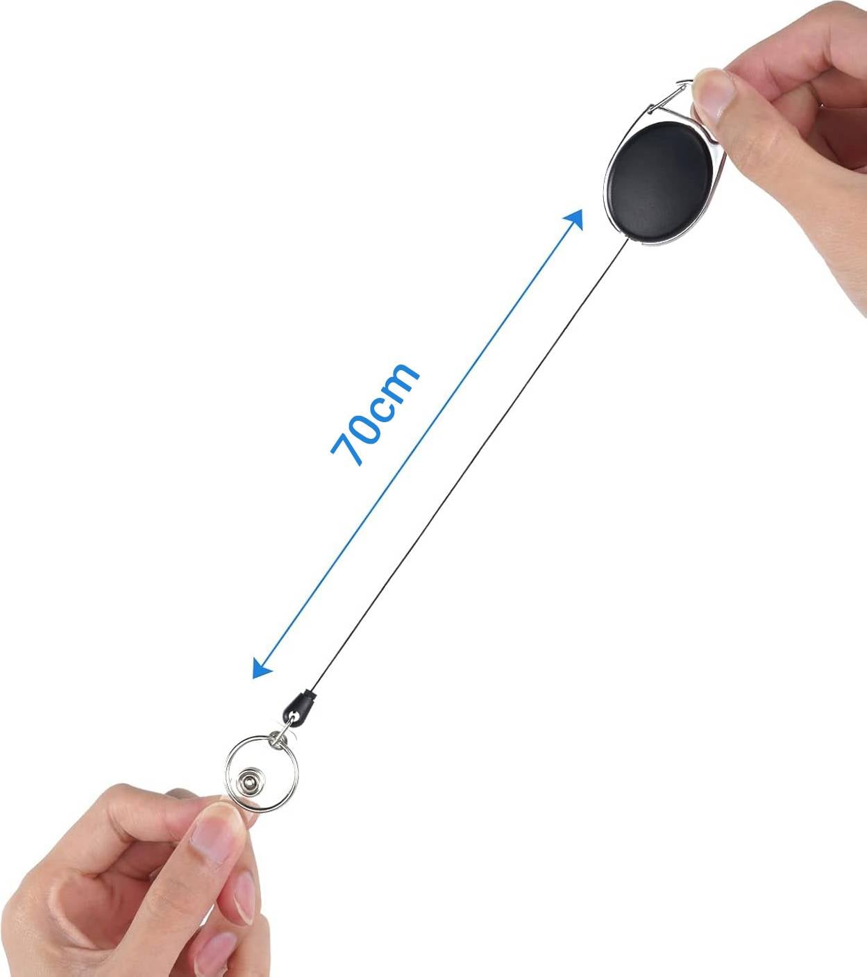 Ręka trzyma wyciągany brelok do kluczy, który można wydłużyć do 70 cm.