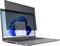 Laptop z otwartym ekranem wyświetlającym menu startowe systemu operacyjnego; zamontowany jest filtr antyodblaskowy, aby zmniejszyć olśnienie.