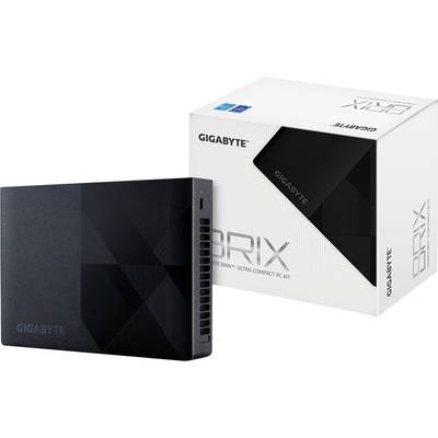 Kompaktowy czarny komputer PC firmy Gigabyte przed opakowaniem. Opakowanie prezentuje nazwę modelu 'BRIX'.