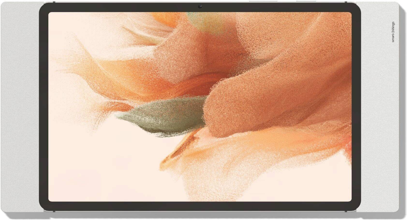 Nowoczesny wyświetlacz z abstrakcyjnym dziełem sztuki składającym się z miękkich, pomarańczowych i zielonych form na jasnym tle.