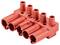 Czerwony, prostokątny złącz z pięcioma gniazdami i trzema okrągłymi otworami przyłączeniowymi na górze, stosowany do połączeń elektrycznych.