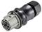 Czarny, cylindryczny wtyk z czterema metalowymi stykami i żebrowanym uchwytem. Odpowiedni do przewodów przemysłowych.