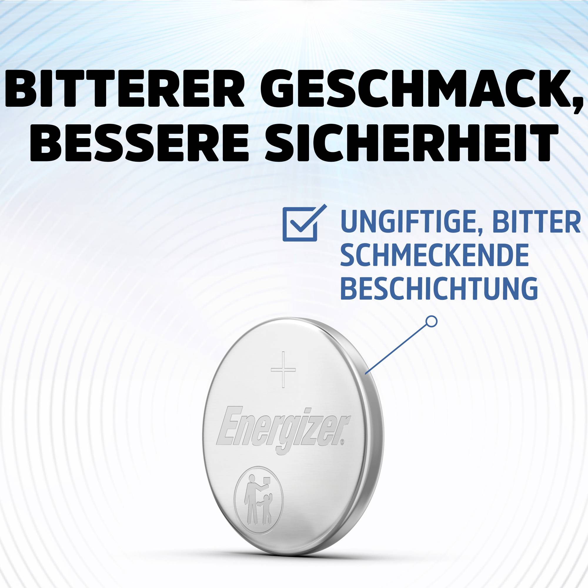 Srebrna bateria guzikowa z wytłoczonym napisem 'Energizer' oraz zaznaczoną 'nietoksyczną, gorzką powłoką'. Tekst u góry: 'Gorzki smak, lepsza ochrona'.