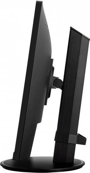 Widok z boku płaskiego monitora na okrągłej podstawce, w kolorze czarnym, lekko pochylonego do tyłu.