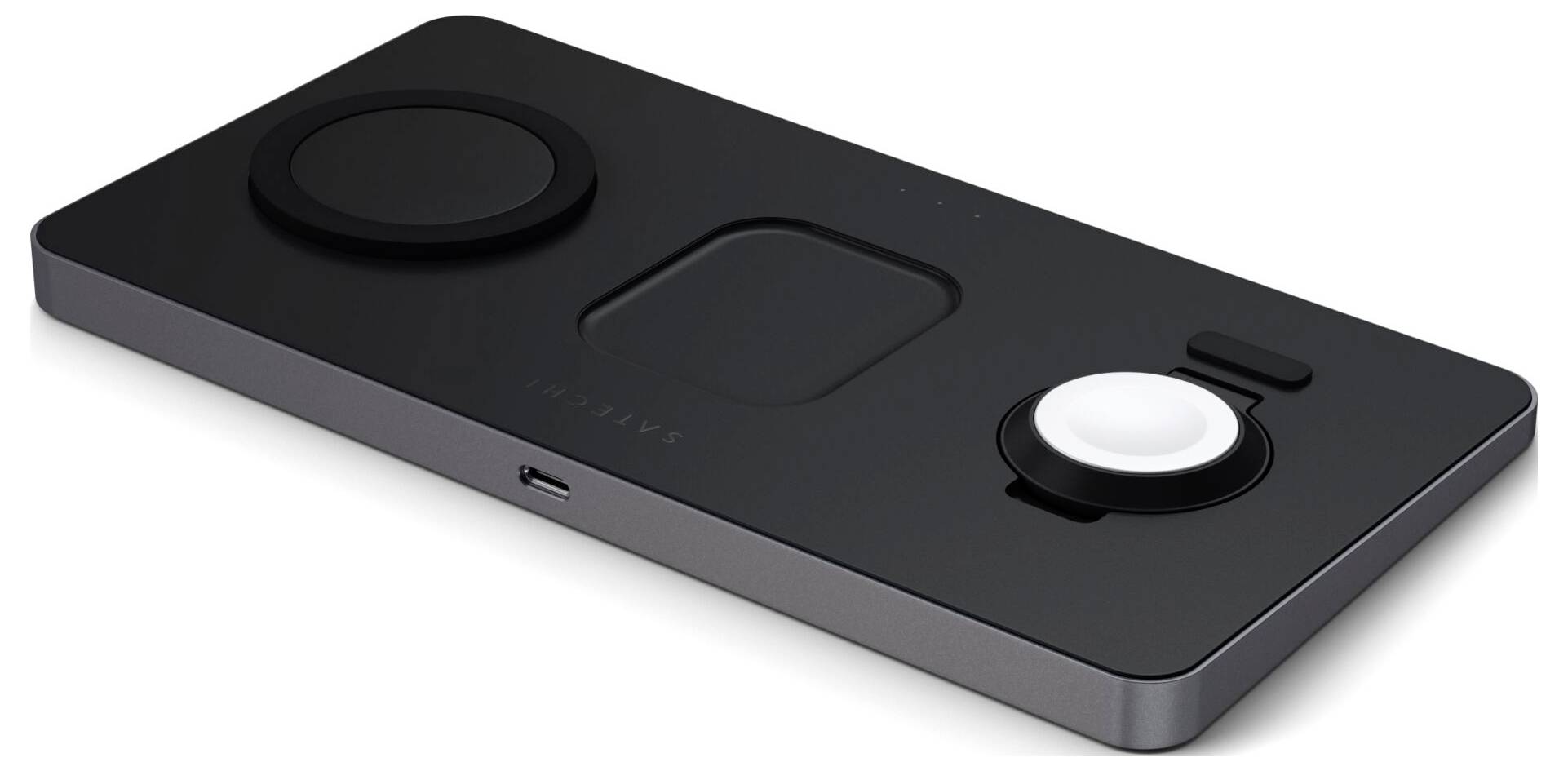 Czarna, prostokątna stacja ładowania z dwoma okrągłymi powierzchniami ładującymi i złączem USB z boku.