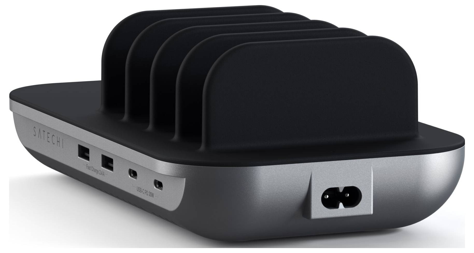 Czarna stacja ładowania z wieloma portami USB do jednoczesnego ładowania wielu urządzeń. Prostokątny kształt z falistą górną powierzchnią.