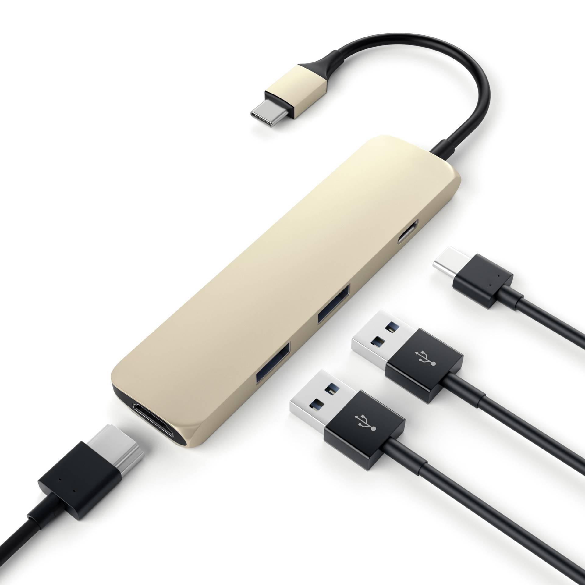 Concentrator USB-C z wieloma portami, w tym HDMI, USB i USB-C, obok niego trzy kable podkreślające jego wszechstronność.
