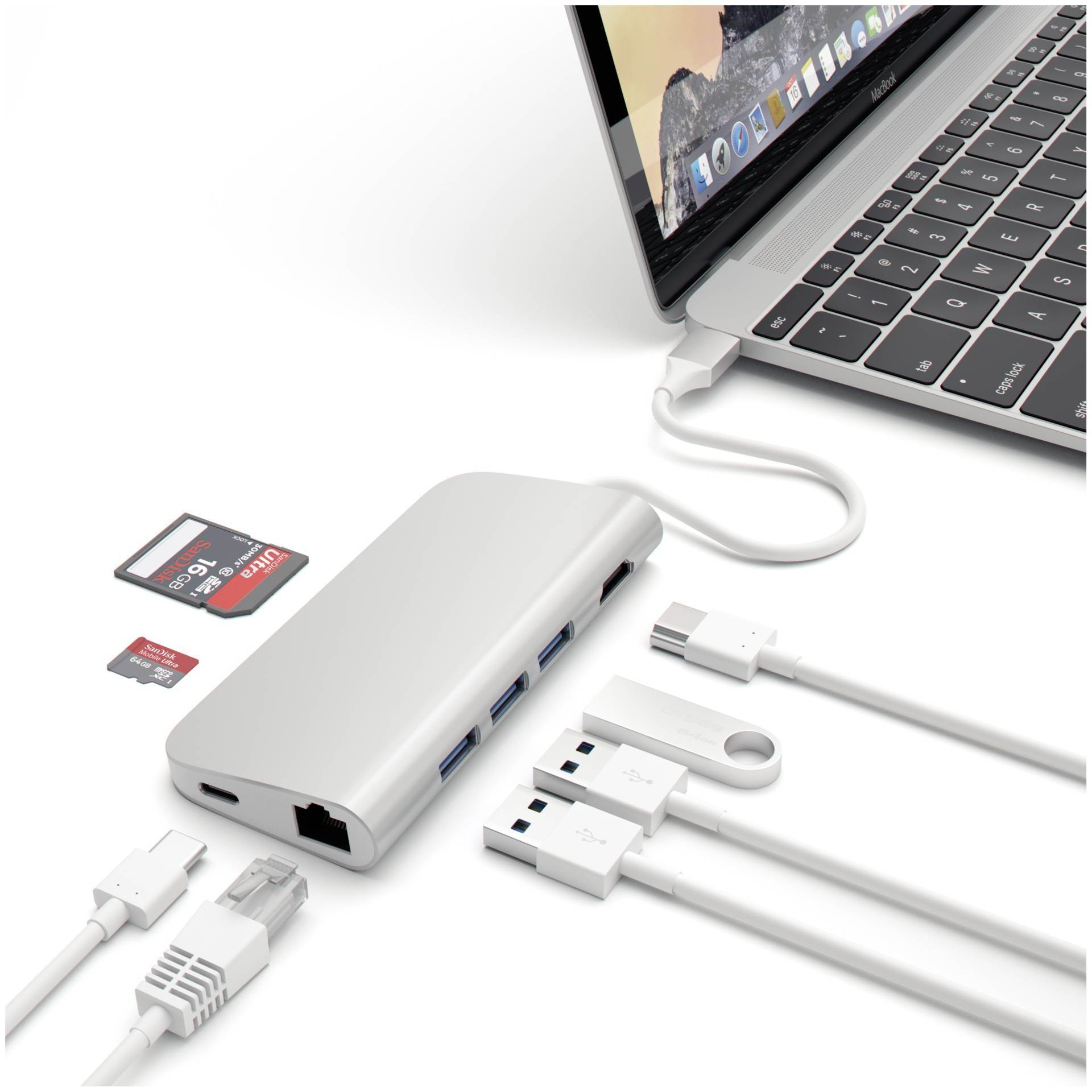 Laptop jest podłączony do wieloportowego adaptera, który oferuje różne złącza: USB, HDMI, kartę SD oraz Ethernet.