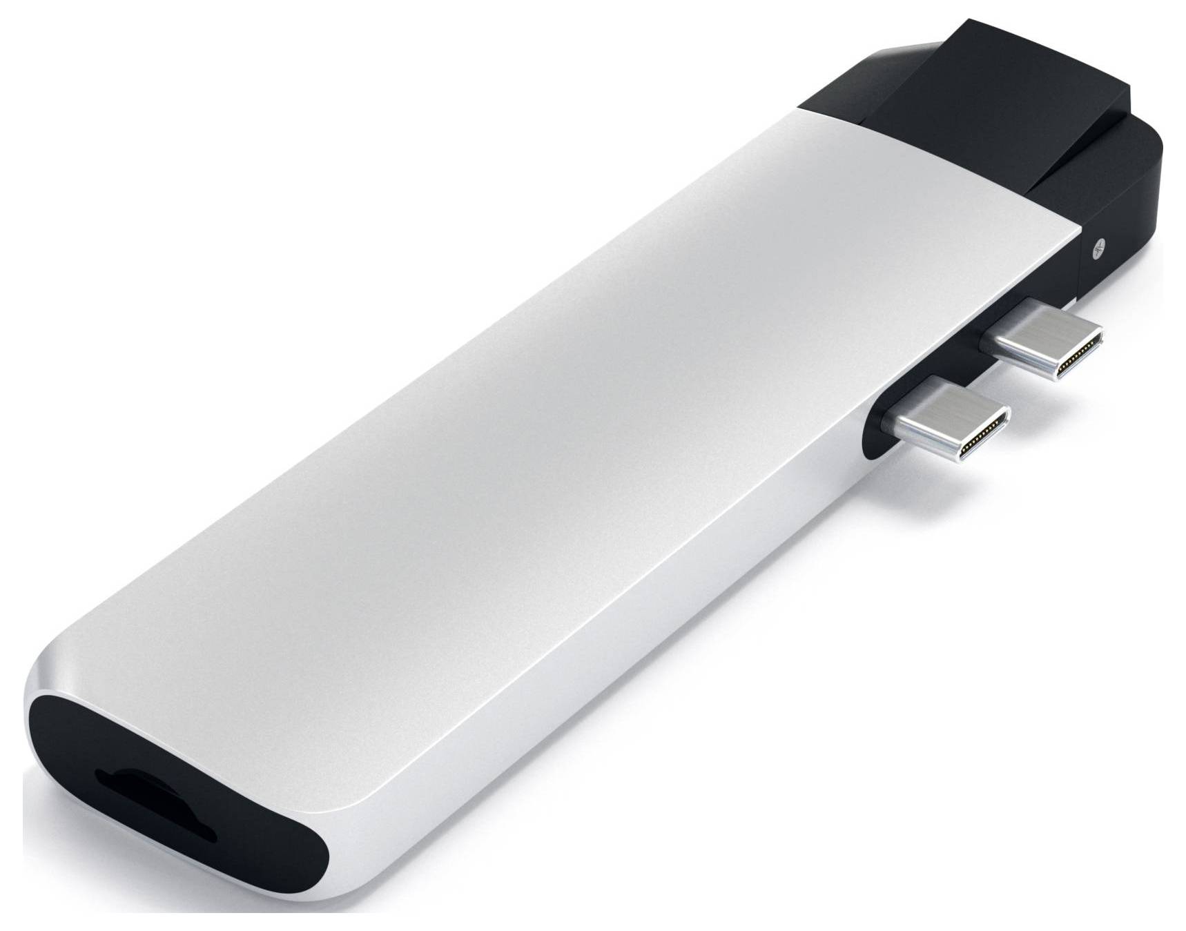 Srebrny adapter USB-C z wieloma portami do podłączania dodatkowych urządzeń. Idealny dla laptopów pozbawionych wbudowanych złączy.