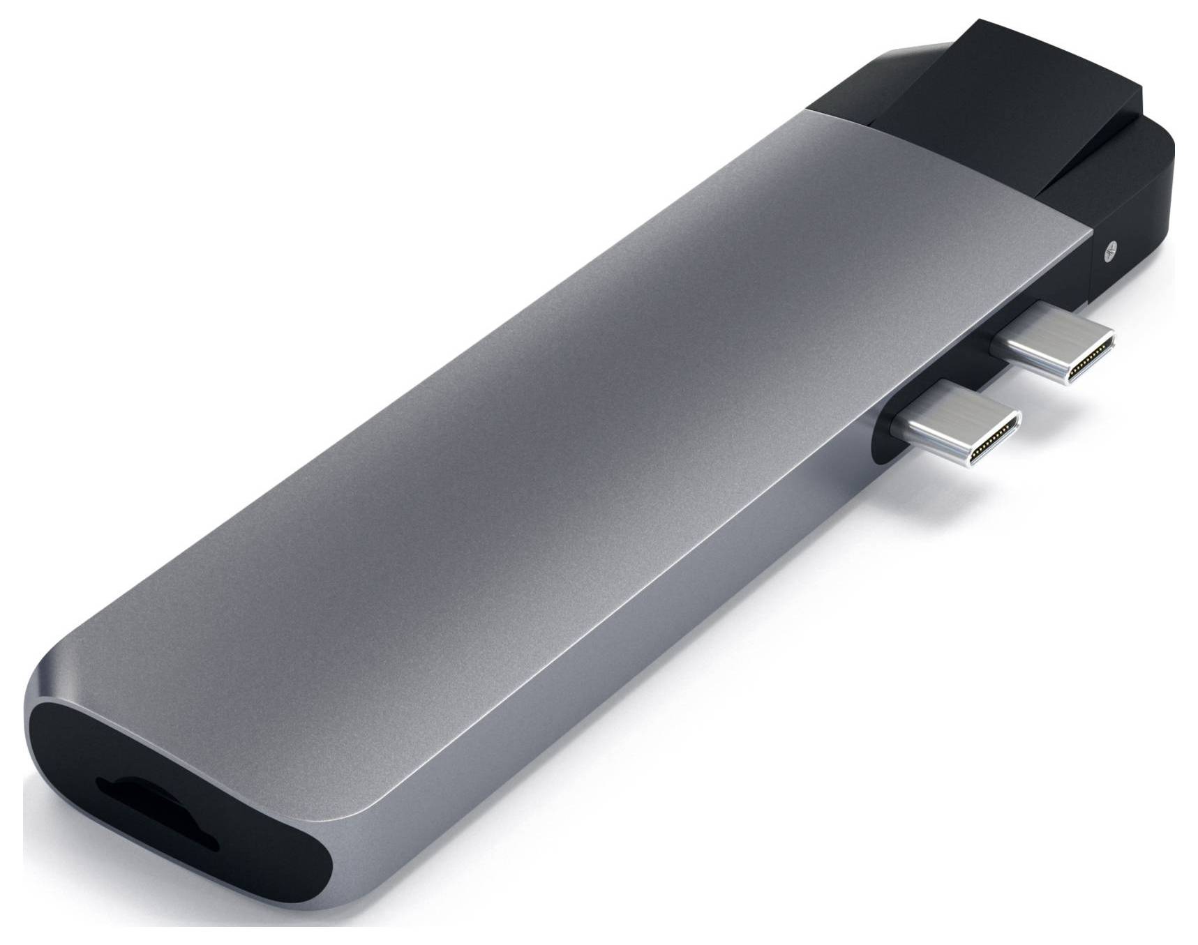 Srebrny hub USB-C z wieloma portami, w tym USB-C i HDMI, rozszerzający możliwości podłączenia urządzeń.