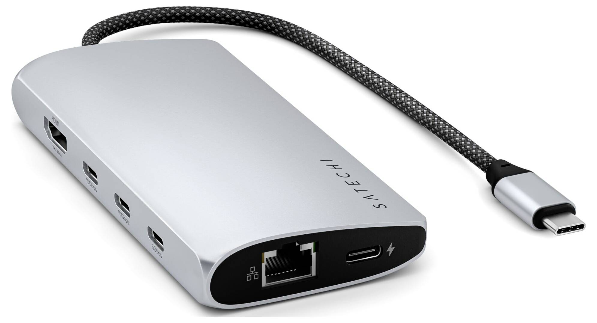Srebrny hub USB-C z wieloma portami, w tym HDMI, USB-A, Ethernet i USB-C. Łączy różne urządzenia.